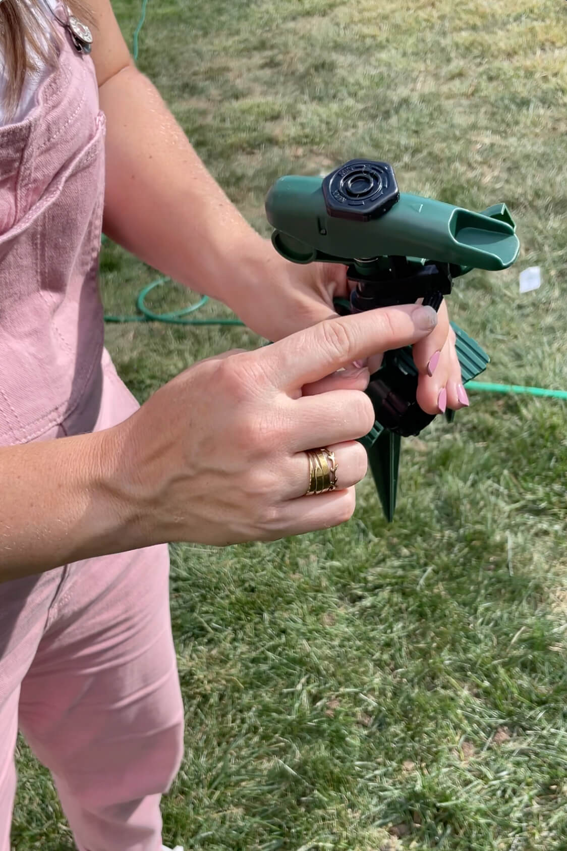 Adjusting your sprinklers for an automatic watering system.